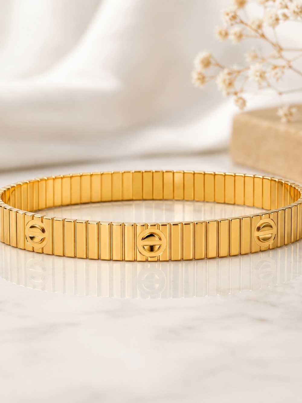Gold Ribbed Stretch Bracelet with Circular Accent